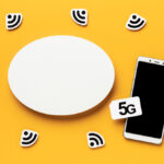 Mesh Wi-Fi router with smartphone and wireless signal icons representing fast 5G and home network connectivity